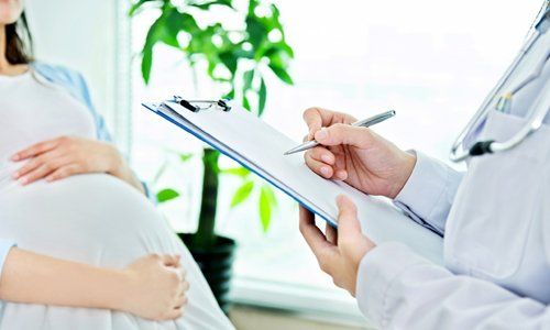 Pregnant Woman Having Gynecological Care — Arlington, TX — Omega Ob-Gyn Associates