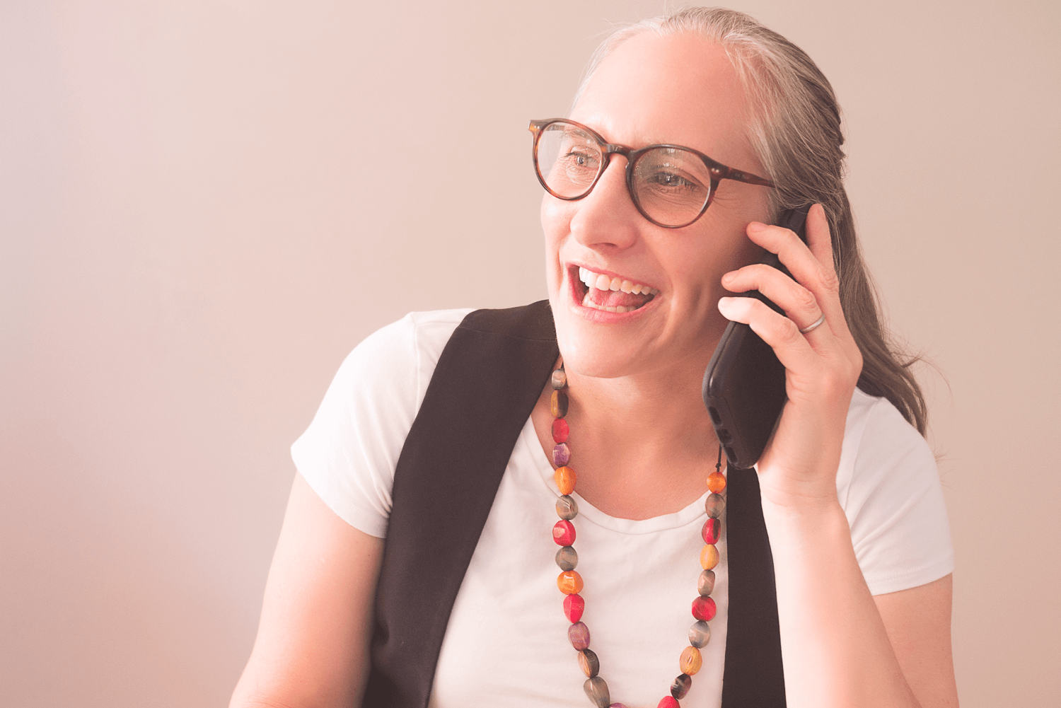 Sally Morris on mobile phone promo photo