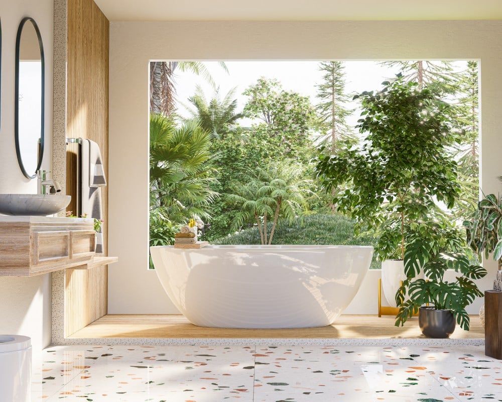 Modern bathroom with a large window overlooking lush greenery. White tub, wood accents, and terrazzo floor.