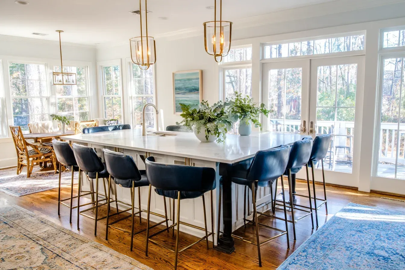 Premium designer kitchen renovation Burnaby BC Canada using Caesarstone counters, white oak cabinetry, and artistic pendant lights. Every surface and fixture is hand-selected for harmony and performance. This Burnaby kitchen captures elegance in its purest form.