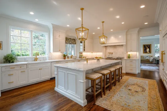 High-end kitchen remodel Burnaby British Columbia with custom millwork, granite surfaces, and under-cabinet lighting. Expert builders blend modern technology with classic detail for timeless appeal.
