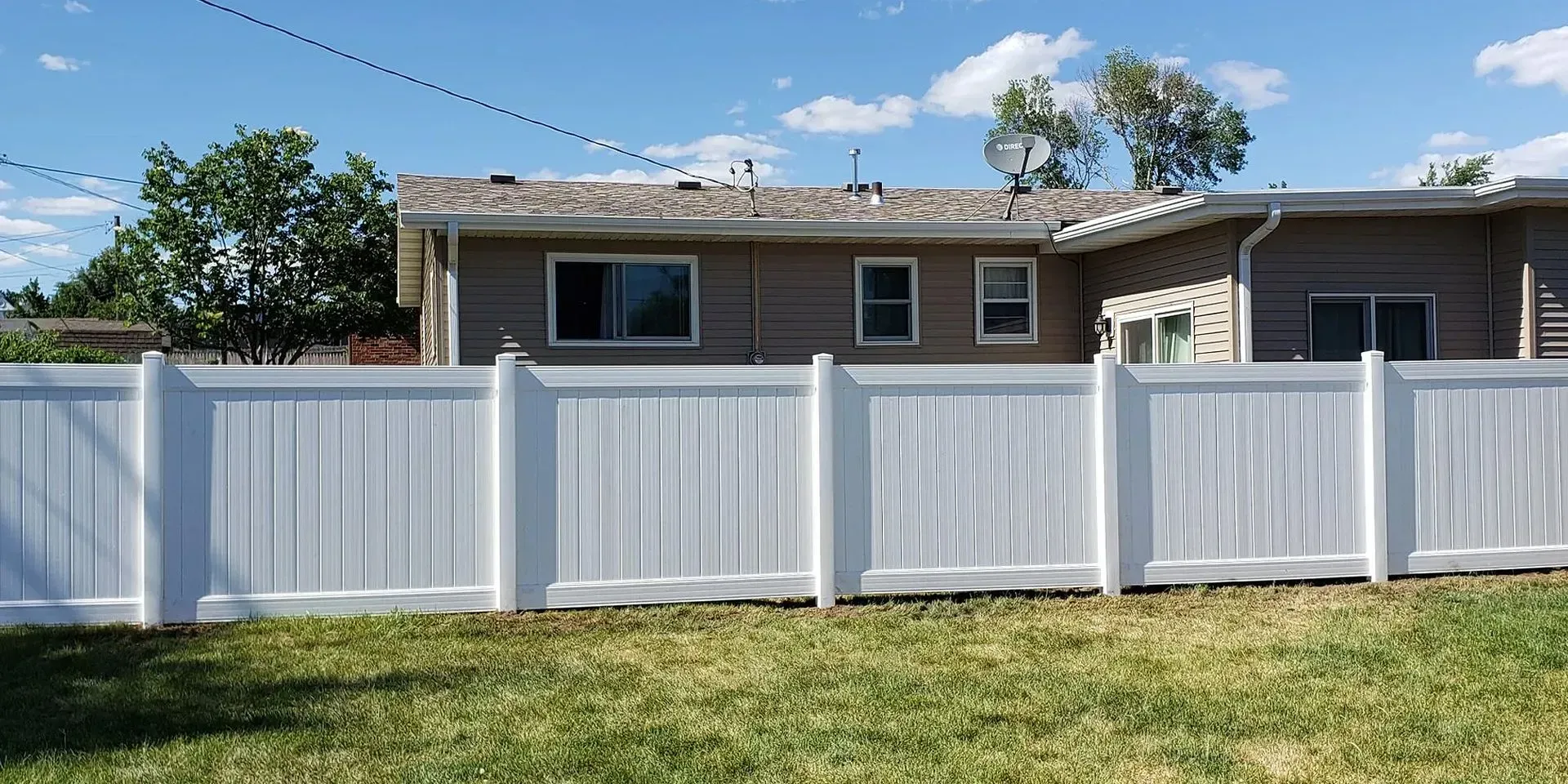 White Vinyl Fences — Marshalltown, IA — Fencing Solutions