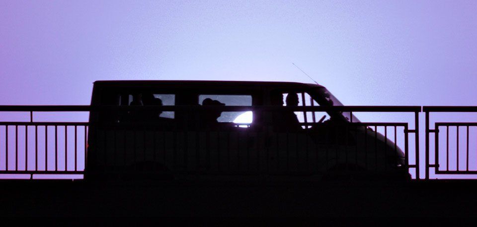 people travelling in the minibus