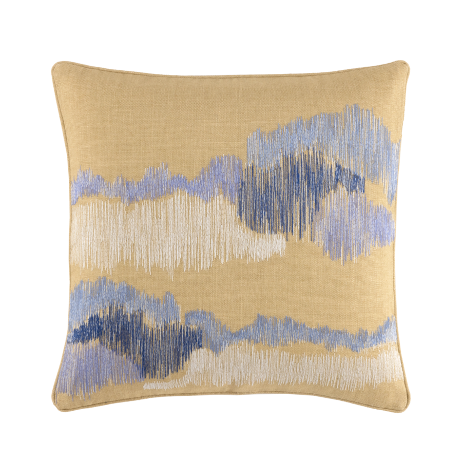 Un oreiller avec un motif bleu et blanc dessus