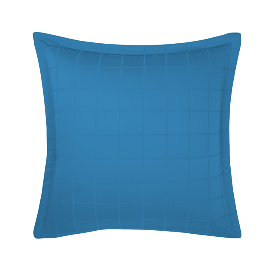 Un coussin carré bleu sur fond blanc