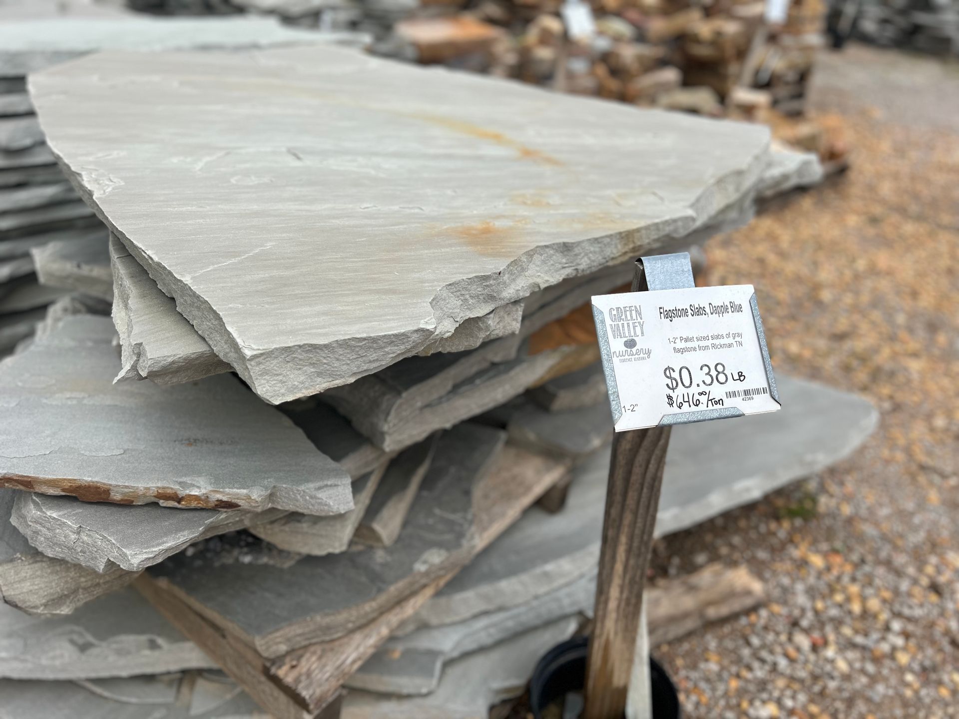 A pile of rocks with a price tag attached to it.