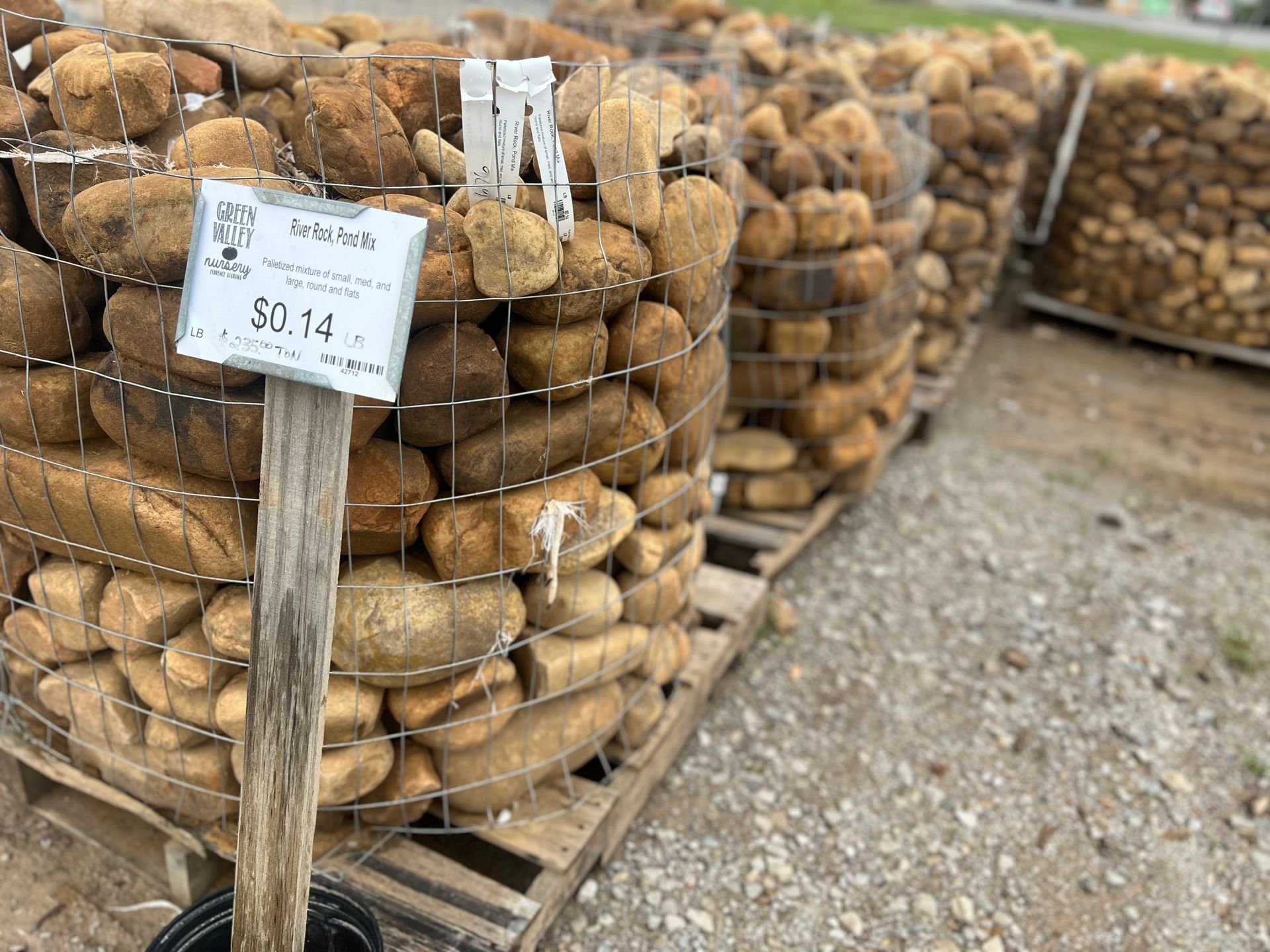 A pile of rocks is sitting on top of a wooden pallet.