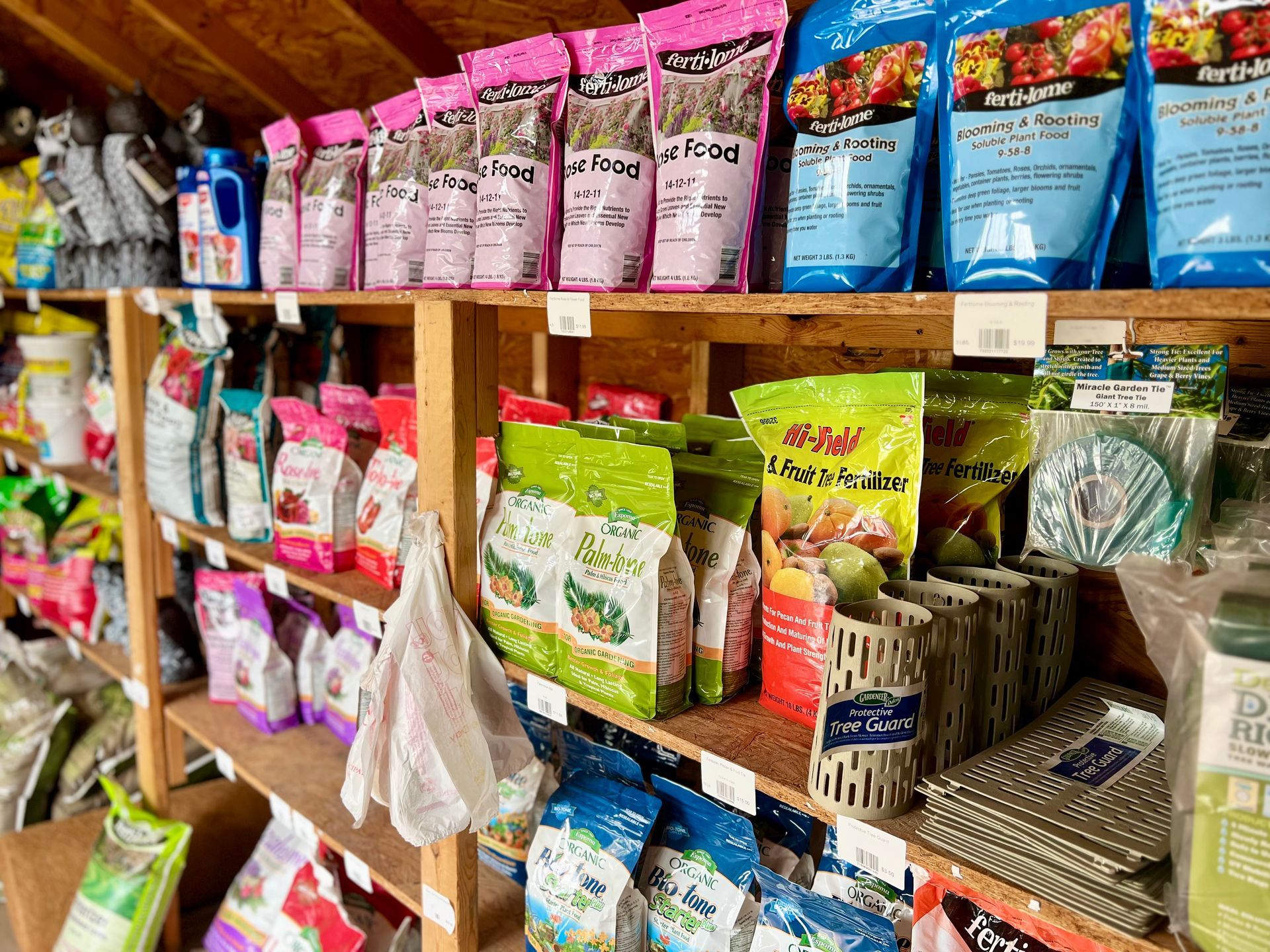 A store shelf filled with lots of bags of food.