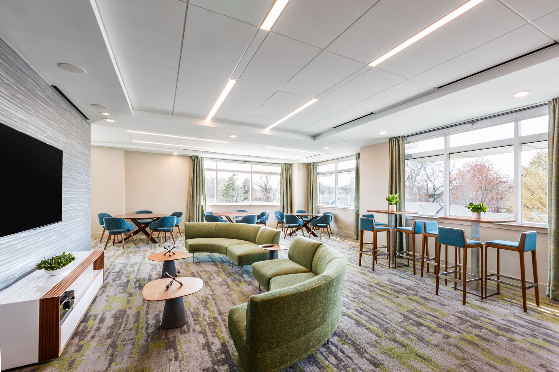 A living room filled with furniture and a flat screen tv.