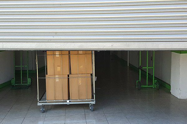 Putting Box In Storage Unit — Brownsburg, IN — Brownsburg Self Storage Locker Inc