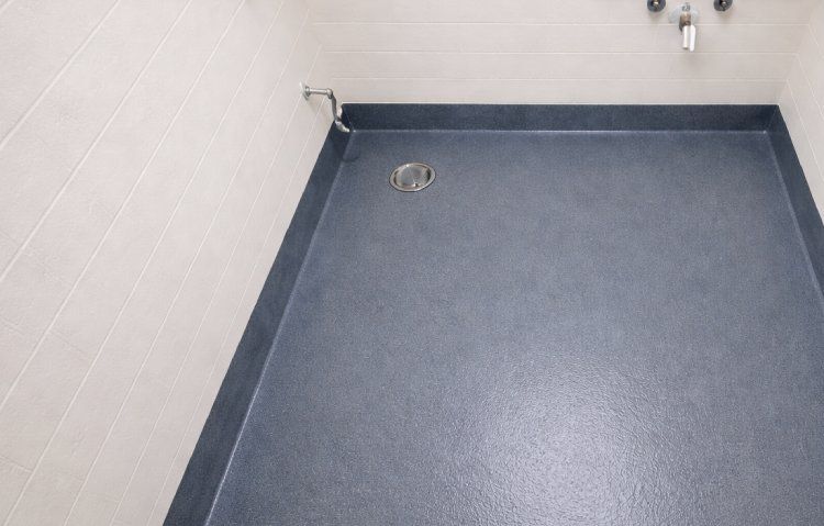 industrial utility room with drain and pipes