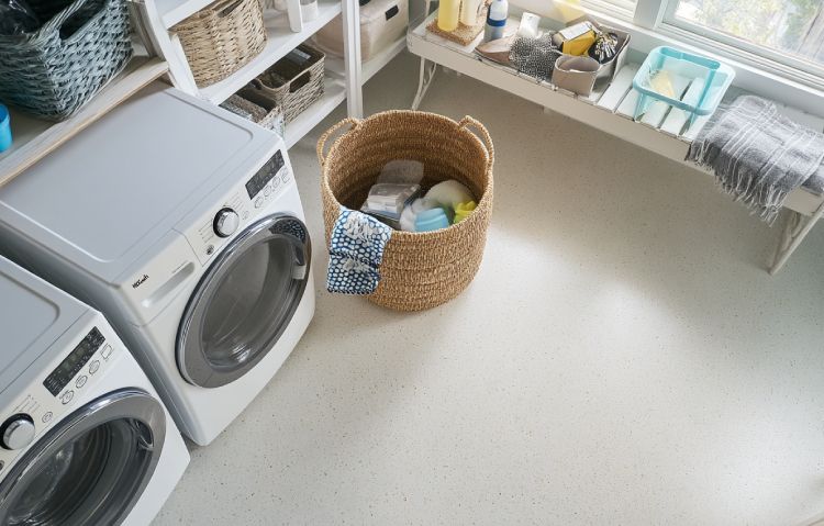 laundry room with seamless epoxy flooring