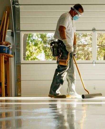 worker applying fresh epoxy coat