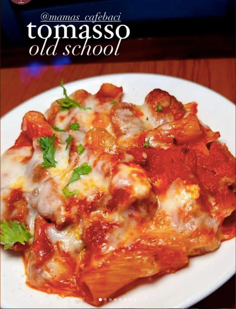 A close up of a plate of food with the words tomasso old school at Mama’s Cafe Baci
