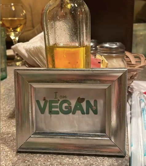A picture frame that says i am vegan on it