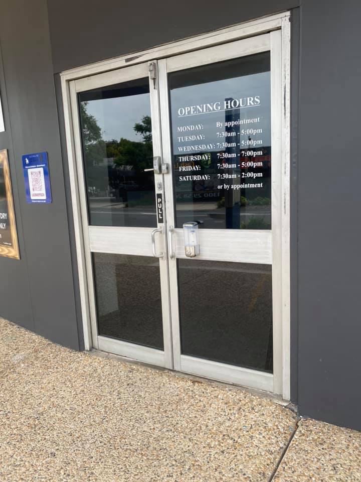 Commercial Glass Door Heavily Tinted for Privacy — Wide Bay Tinting in Kensington, QLD