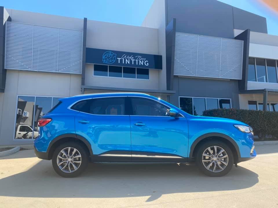 Window of Blue SUV is Tinted — Wide Bay Tinting in Kensington, QLD
