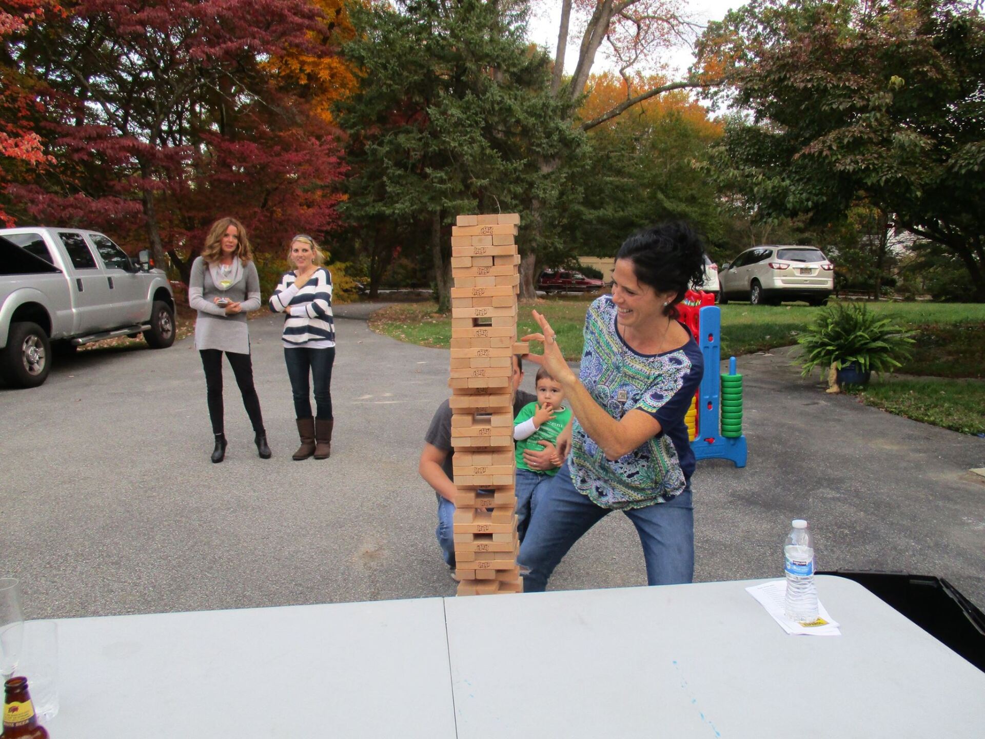 Woman Playing Jenga Outdoor — Dover, DE — Mobile Cloud Video Game Party