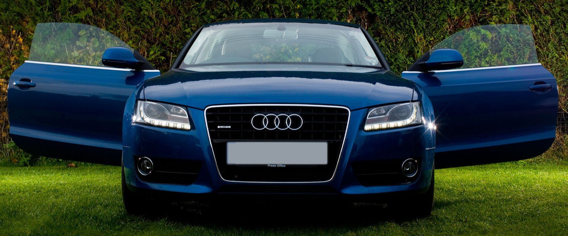 A blue Audi car