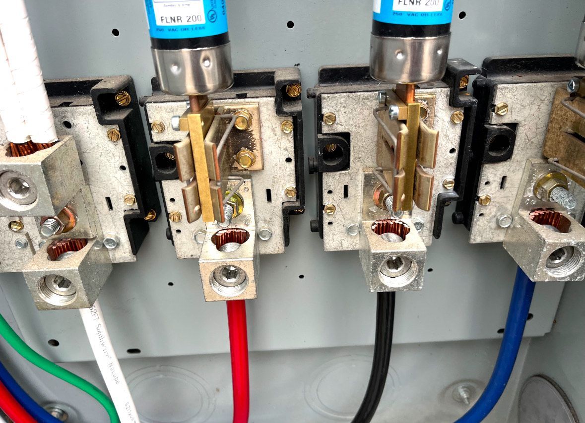 A bunch of wires are connected to a electrical box