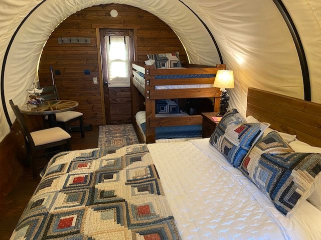 Covered wagon Glamping bed