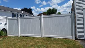 Tall fence blocking yard from view