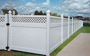 New white fence installed by fencing contractors