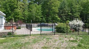 Newly installed fence blocking a pool