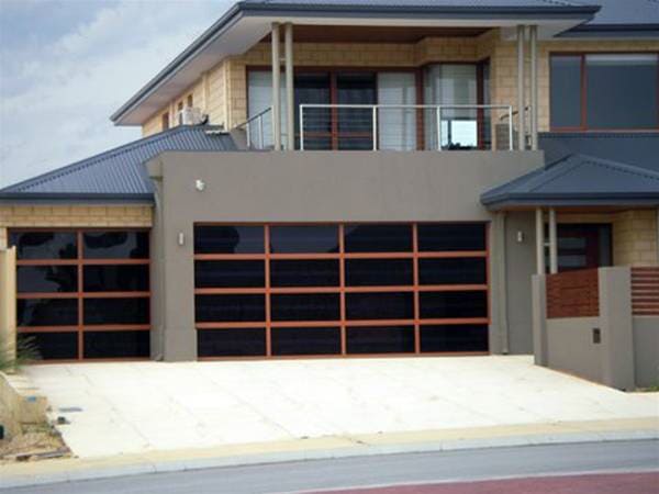 Black garage door — Designs in Taree, NSW
