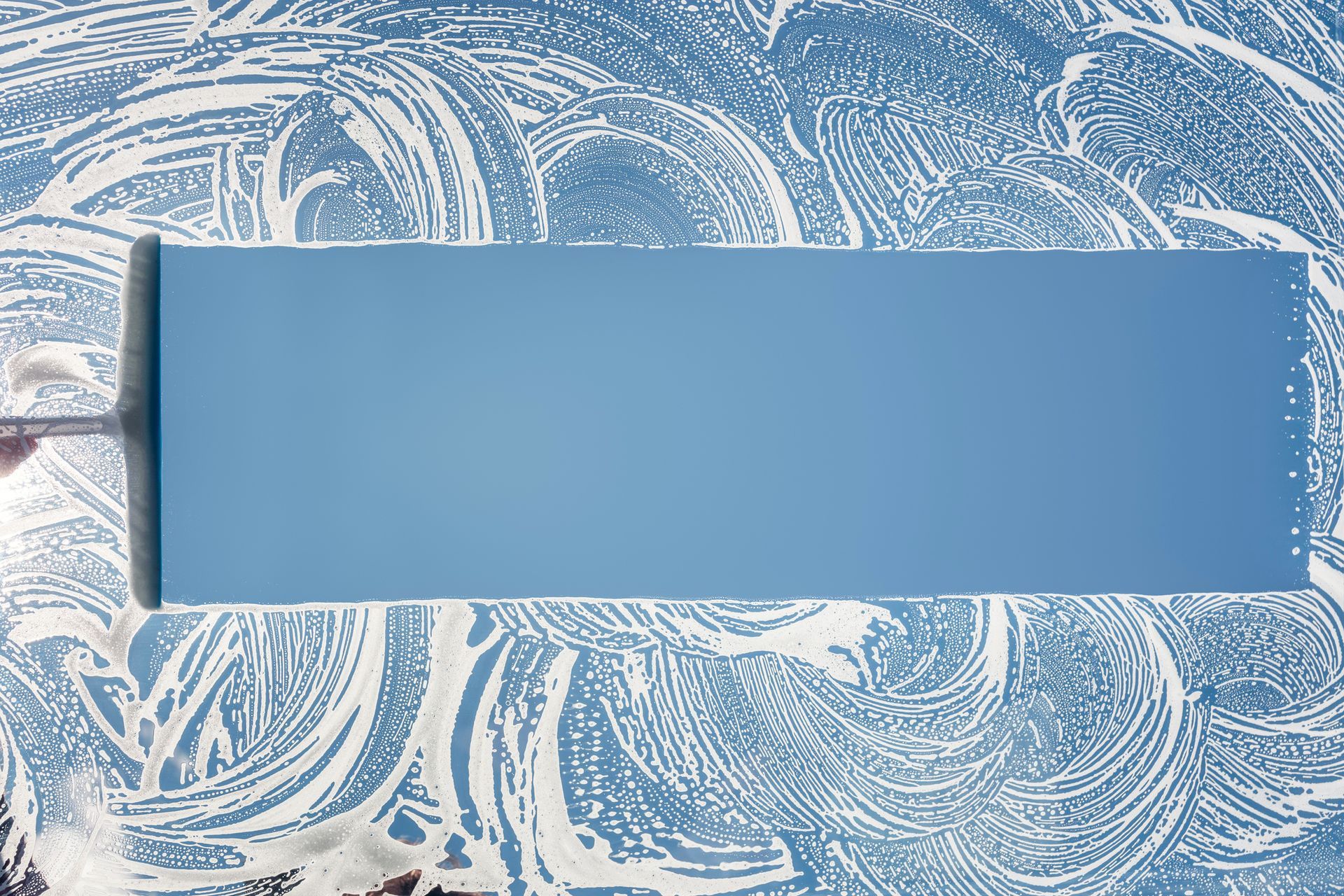 Light-colored tiled floor with cabinet on right, a red toolbox is visible.