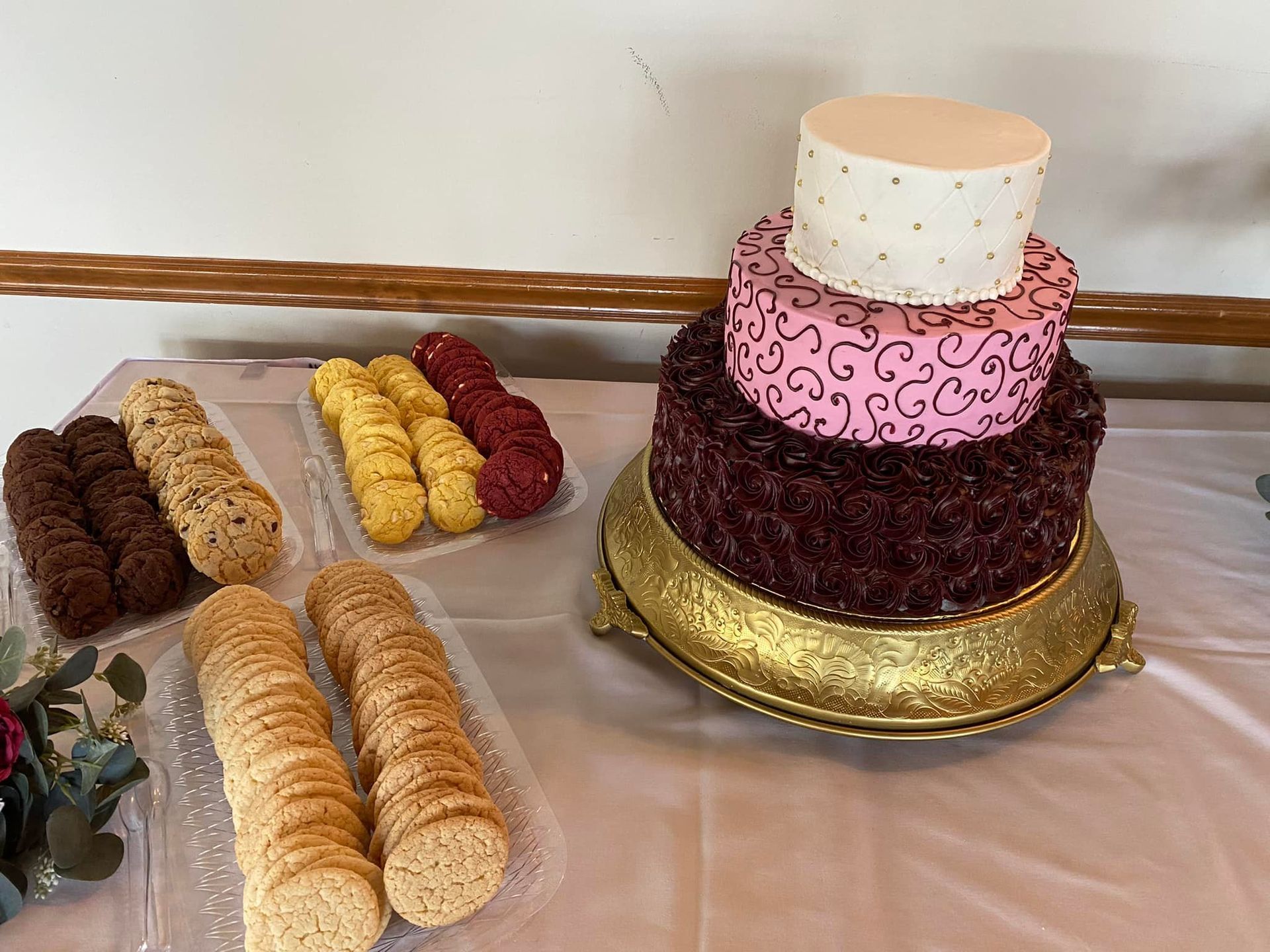 pink and brown cake with cookies