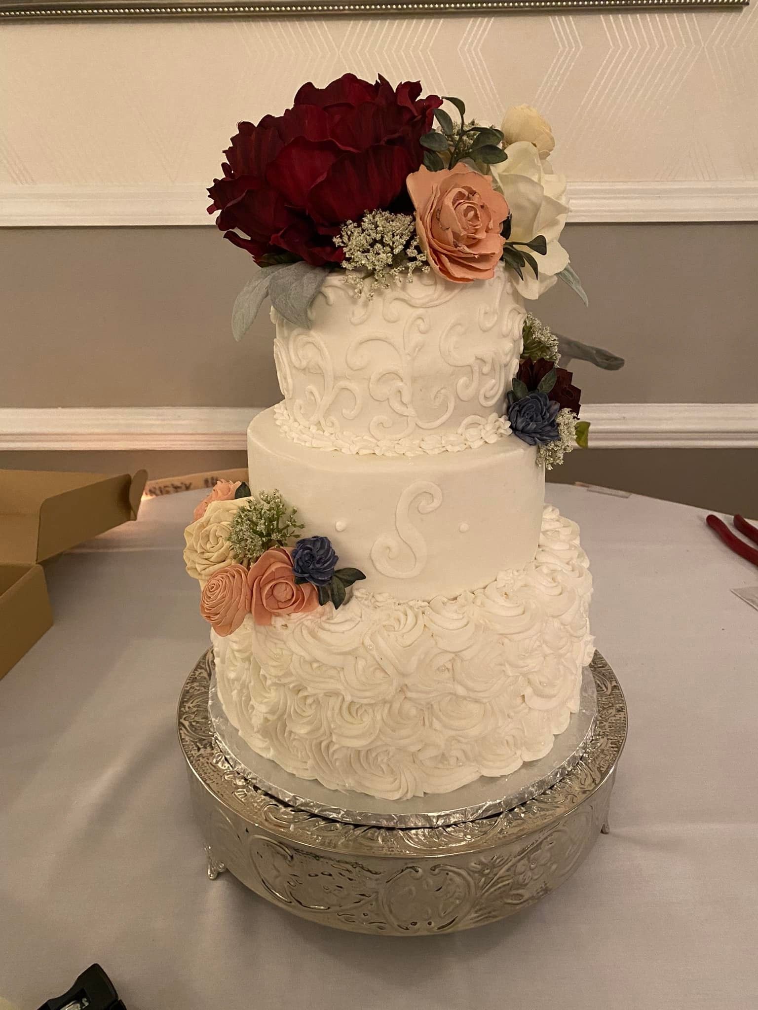 wedding cake with frosted swirl design