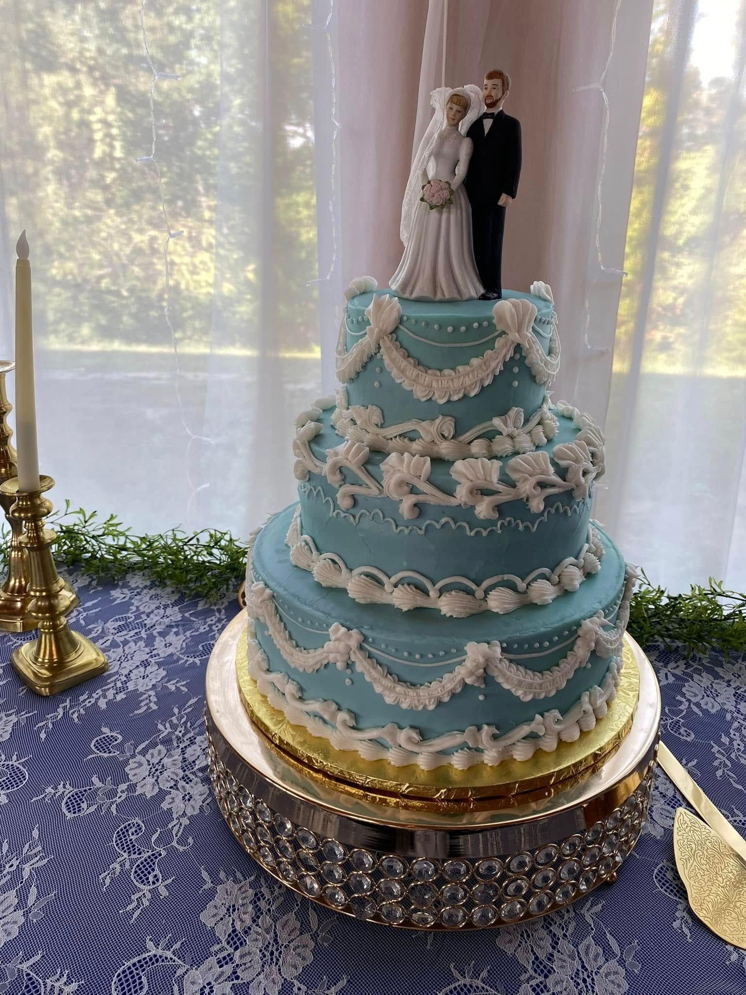 blue wedding cake with white details
