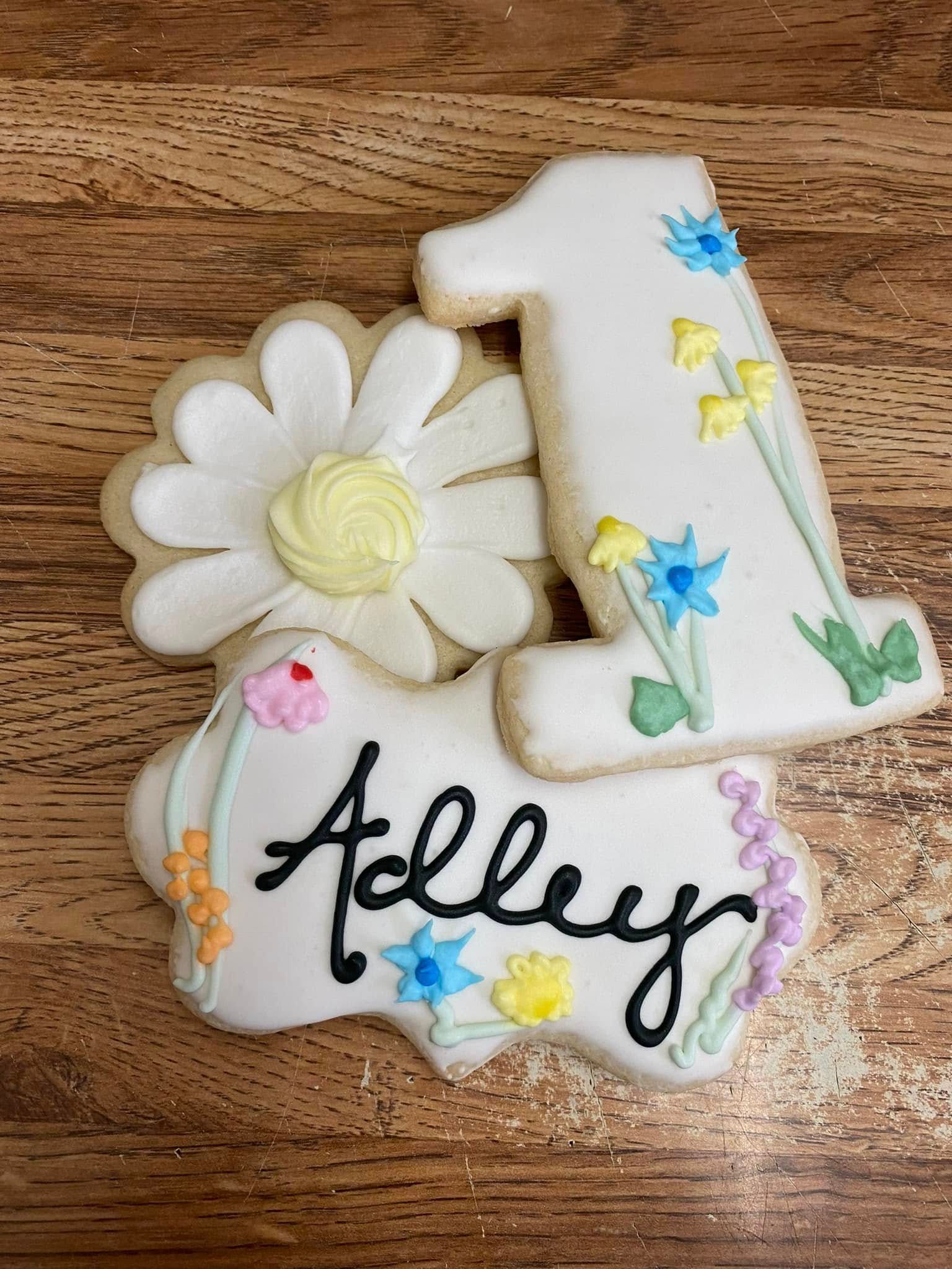 floral first birthday cookies