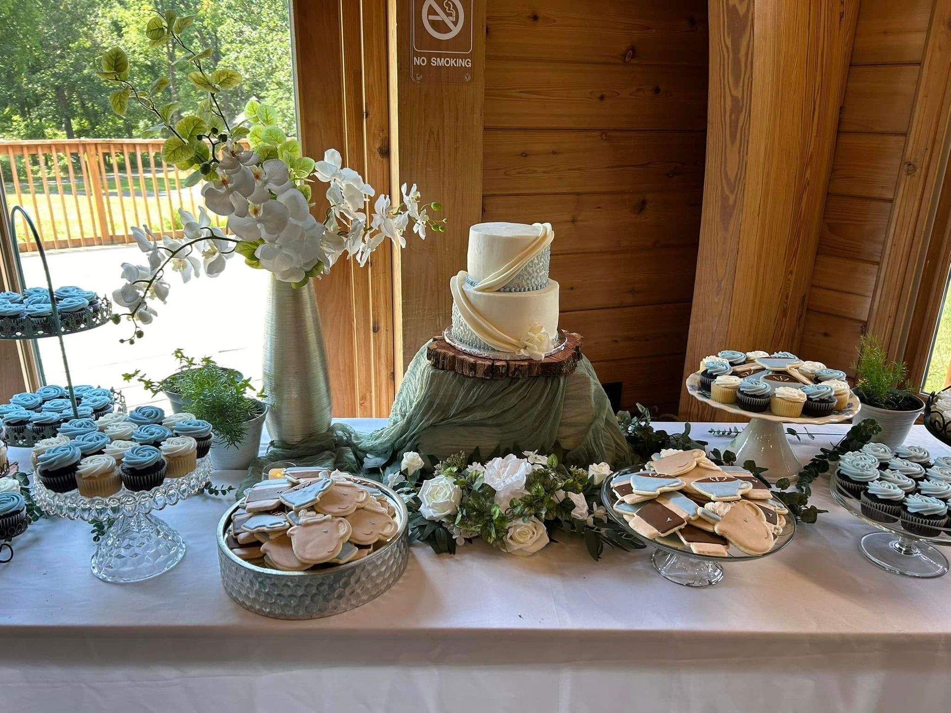 wedding cake, cupcakes, and cookies