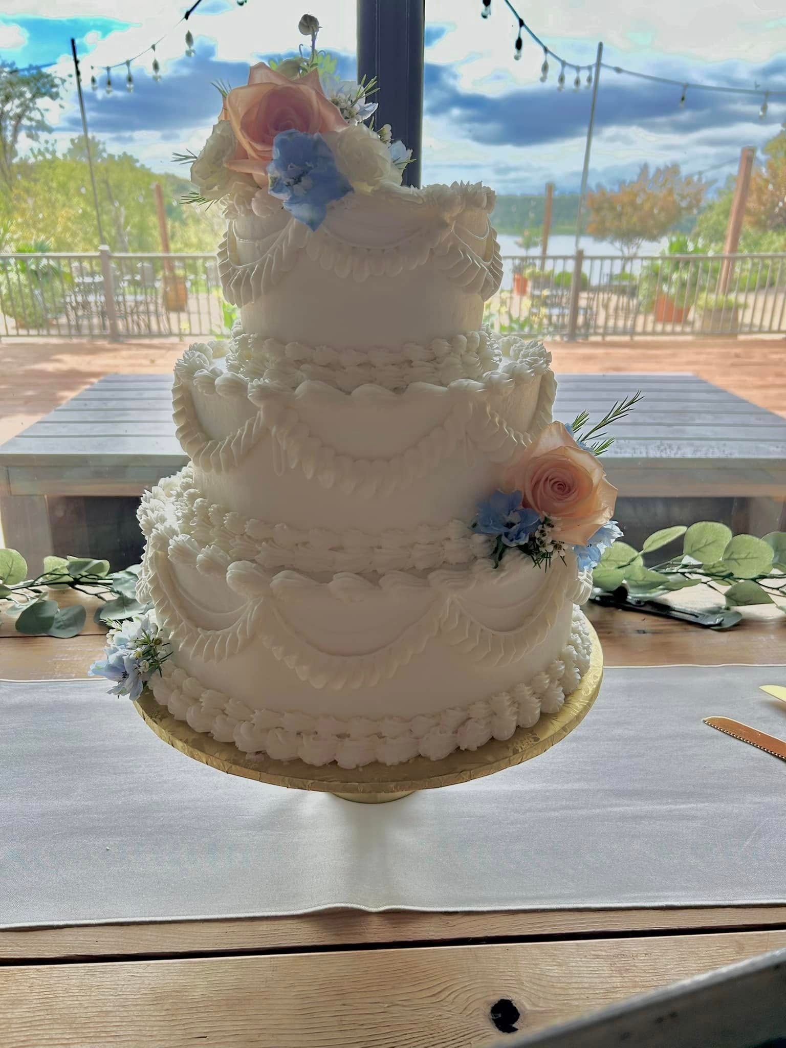 ornate frosted wedding cake