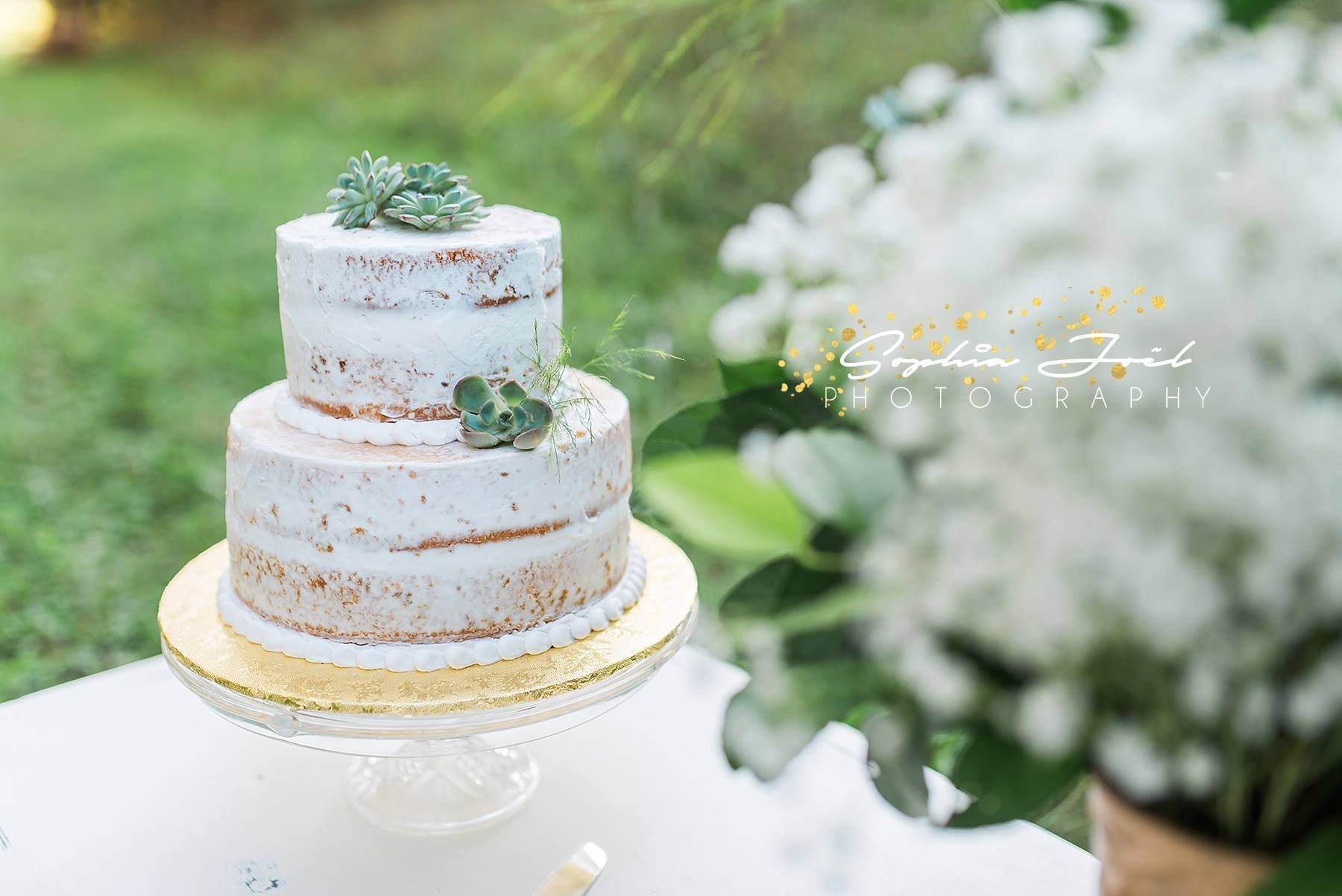 two tier rough iced wedding cake