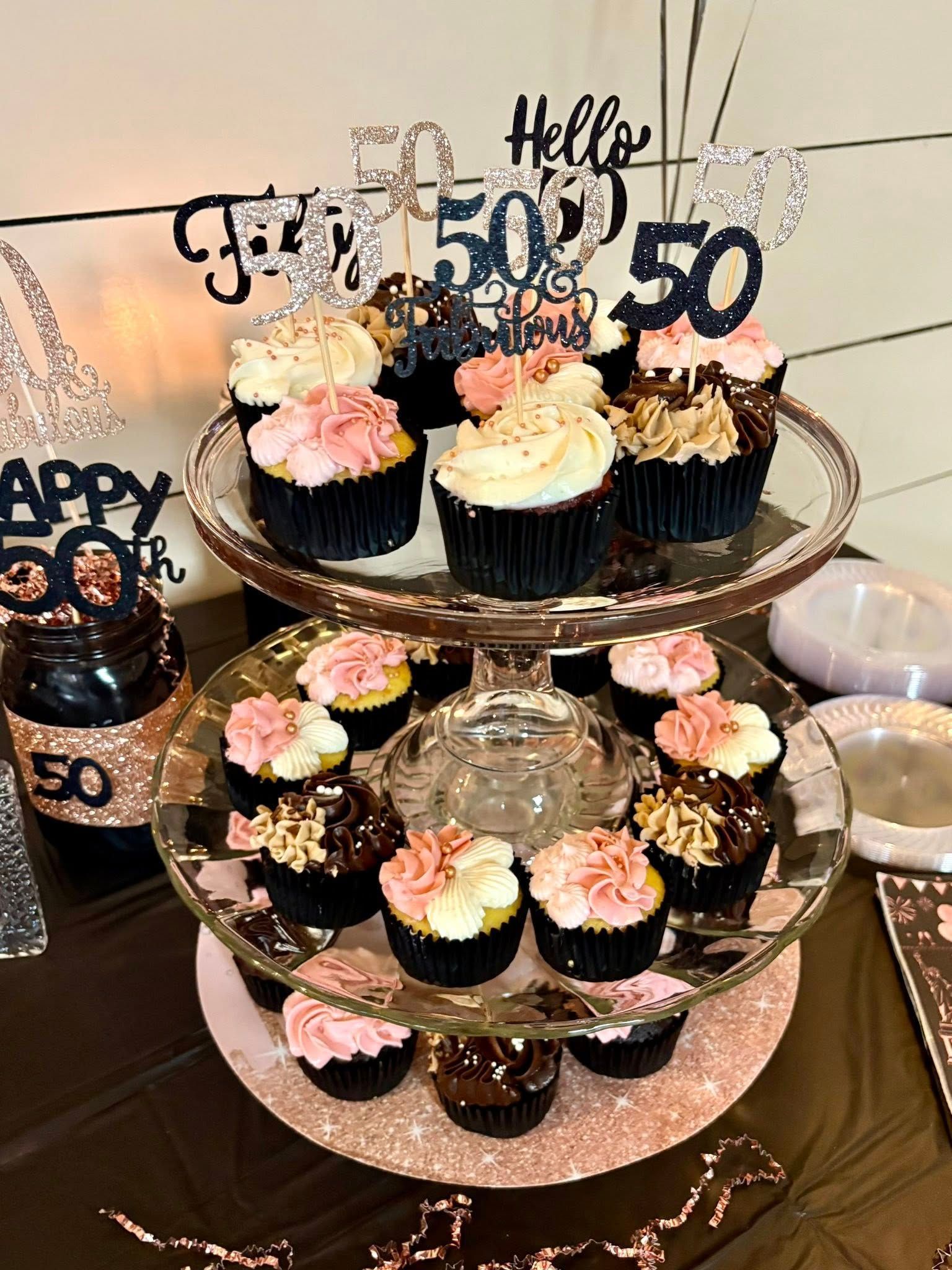 pink and black 5oth birthday cupcakes