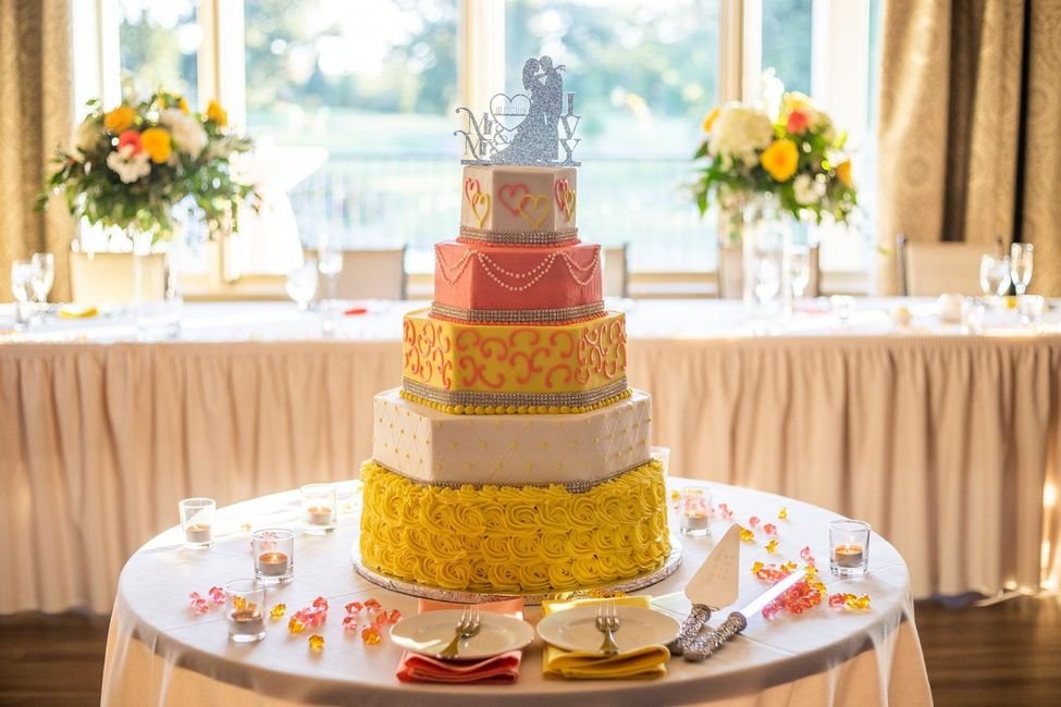 five tier pink and yellow birthday cake