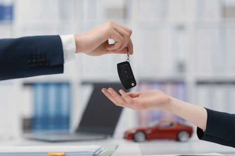 Auto Insurance — Woman Purchasing A New Car in Berlin, NH
