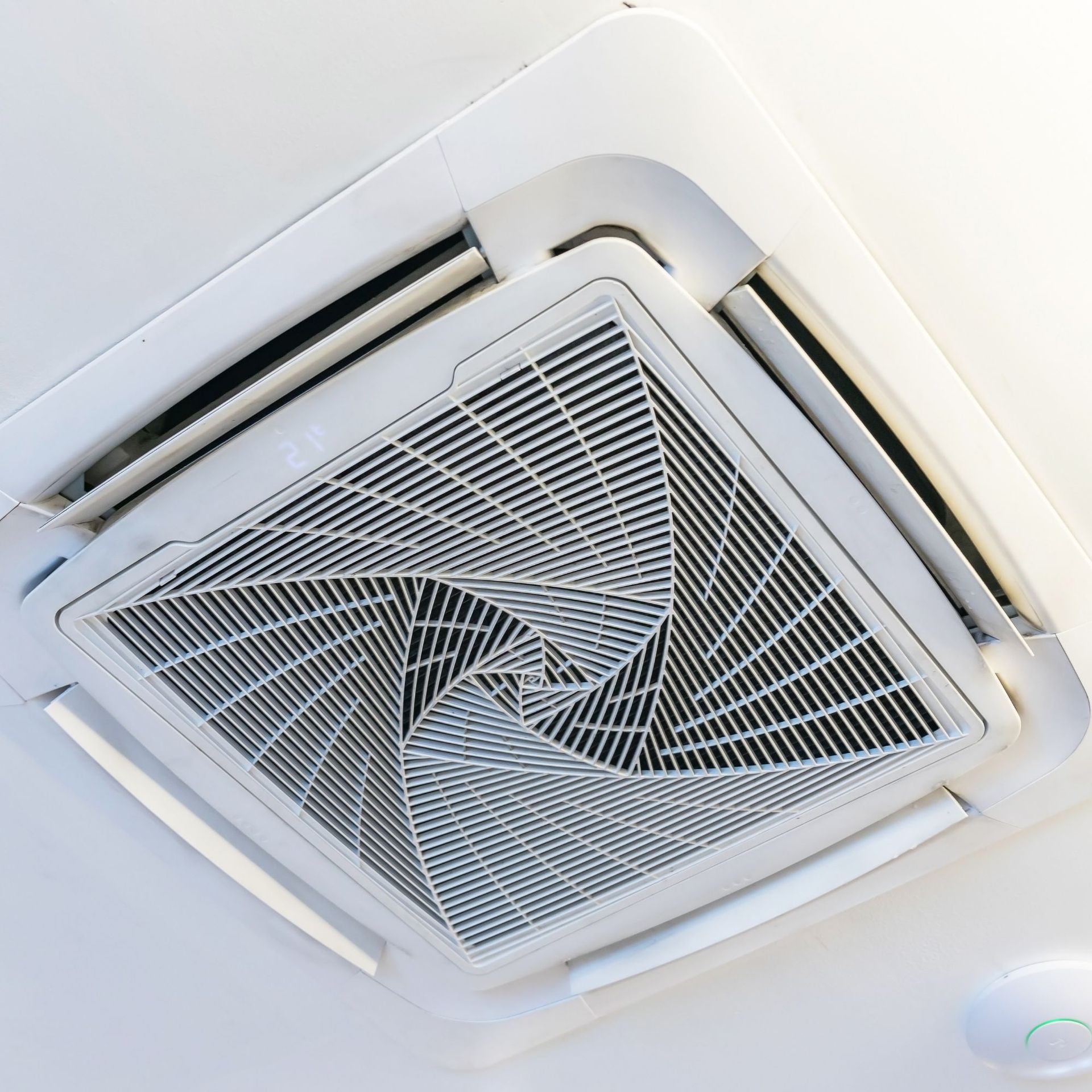 CC Air Services LLC - A ceiling fan with a swirl design on it