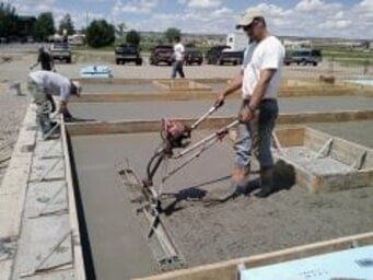 Pouring Concrete Into Hole From Lorry — Concrete Forming in Missoula, MT