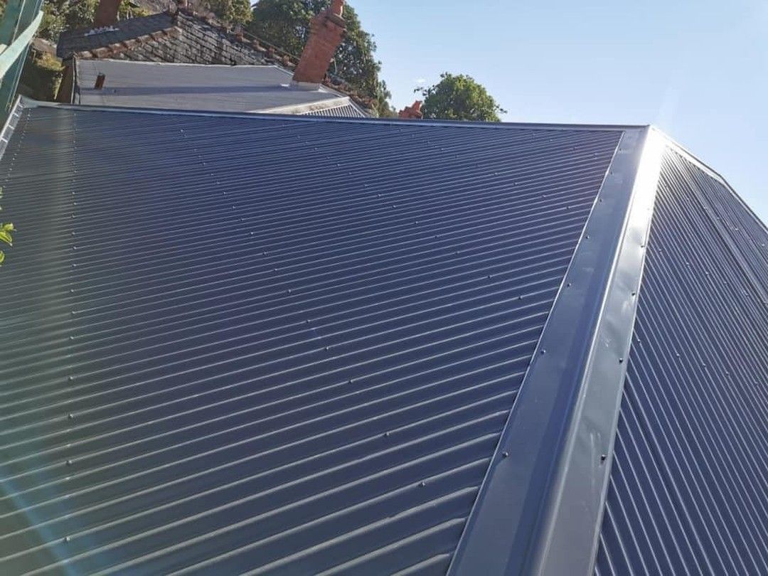 A close up of a roof with the sun shining through it