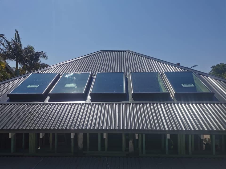 A roof with a lot of windows on it