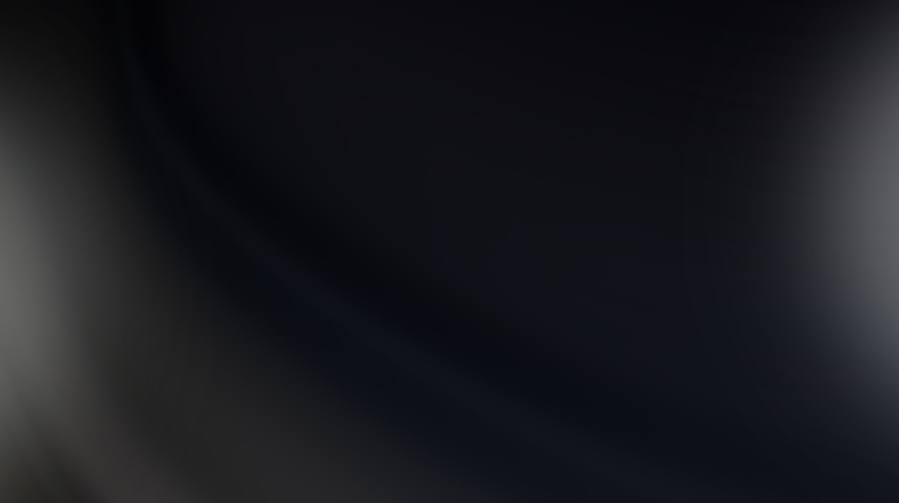 Soft, dark background with a subtle gradient, transitioning from light gray to black.