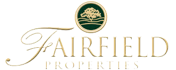 Fairfield Properties logo with script "Fairfield" and a circular emblem with a tree.
