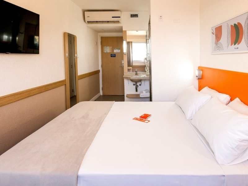Quarto do Hus Hotel Maringá