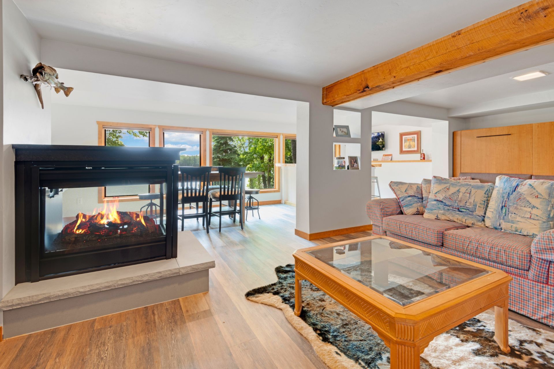 A living room with a fireplace and a couch.
