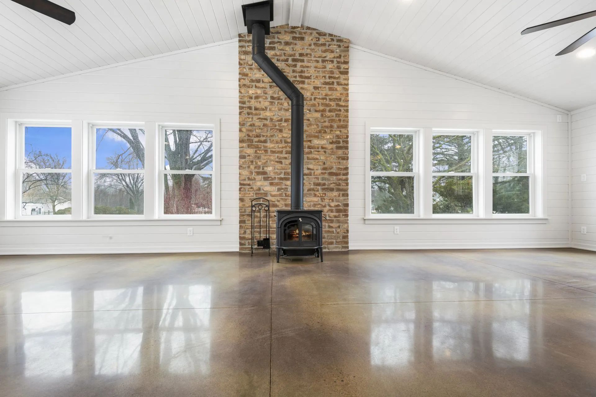 There is a fireplace in the middle of the room.