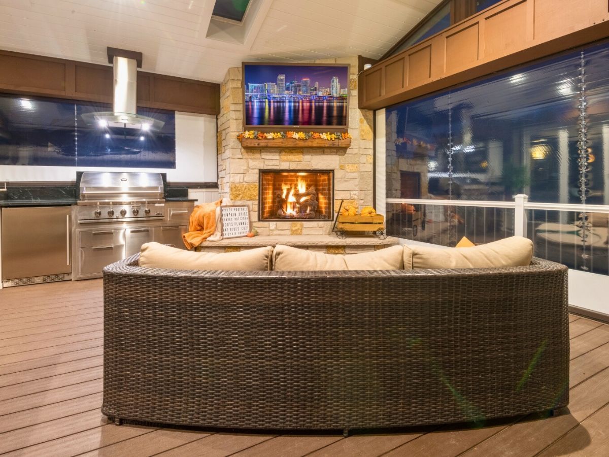 A living room with a fireplace and a couch